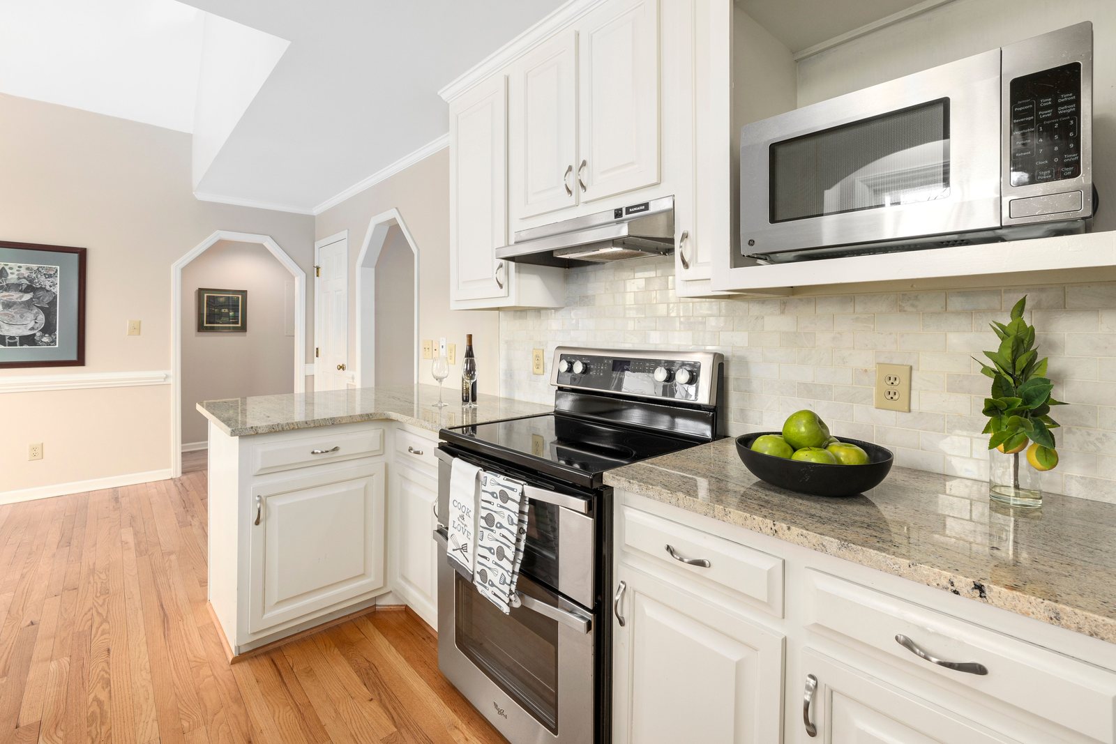 Bright clean kitchen with white cabinets